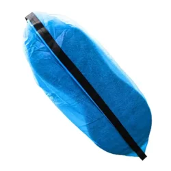 Sole of a blue ESD shoe cover, showcasing the grounding strip running along the bottom of the cover